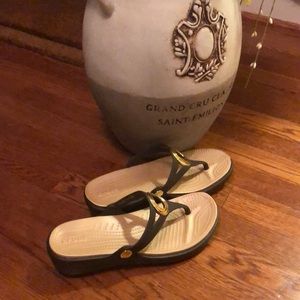 Crocs sandals with gold trim